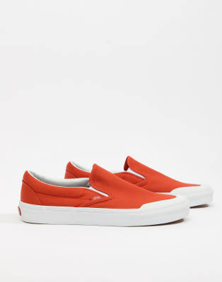orange slip on vans