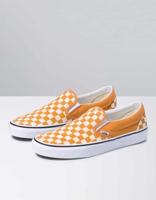 Orange checkerboard slip on vans sale