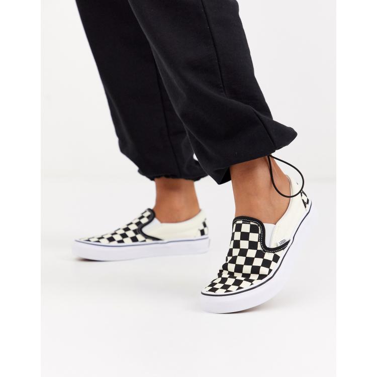 Vans black and white classic best sale slip on