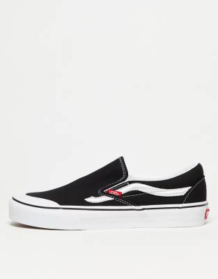 Vans Classic slip on in black with white stripe | ASOS