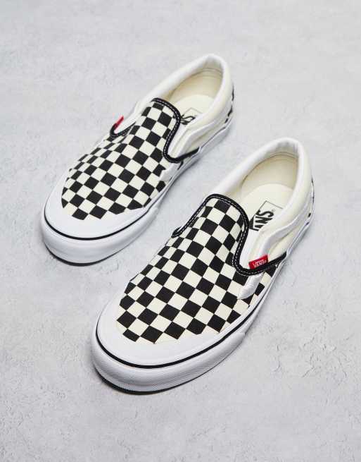 Checkered vans hotsell with red stripe