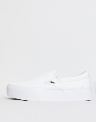white platform vans slip on
