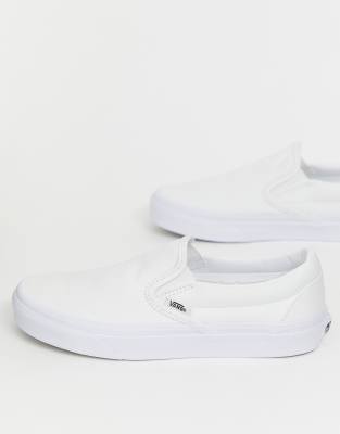 white platform vans slip on