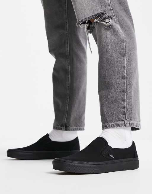 Vans Slip-On plimsolls in black ASOS