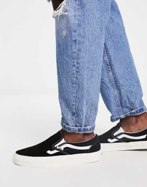 Vans Classic Slip-On Side Stripe sneakers In black | ASOS