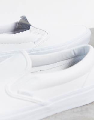 white faux leather slip on sneakers