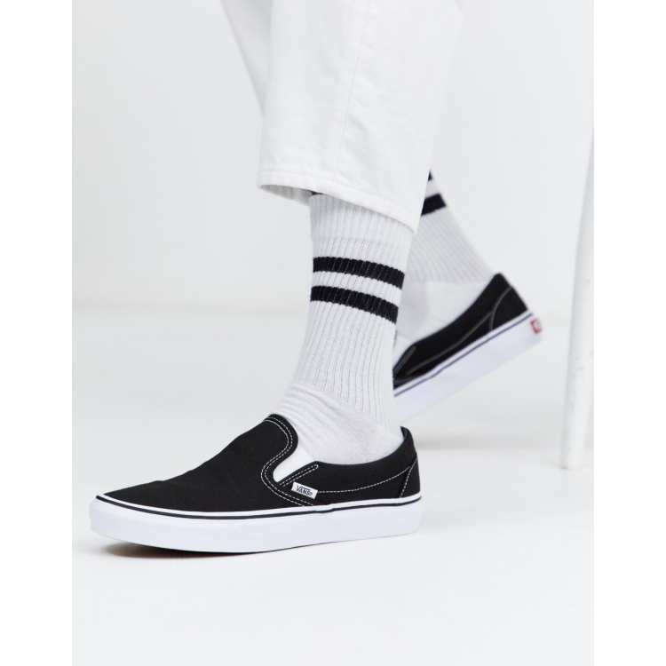 Vans slip on black hotsell and white