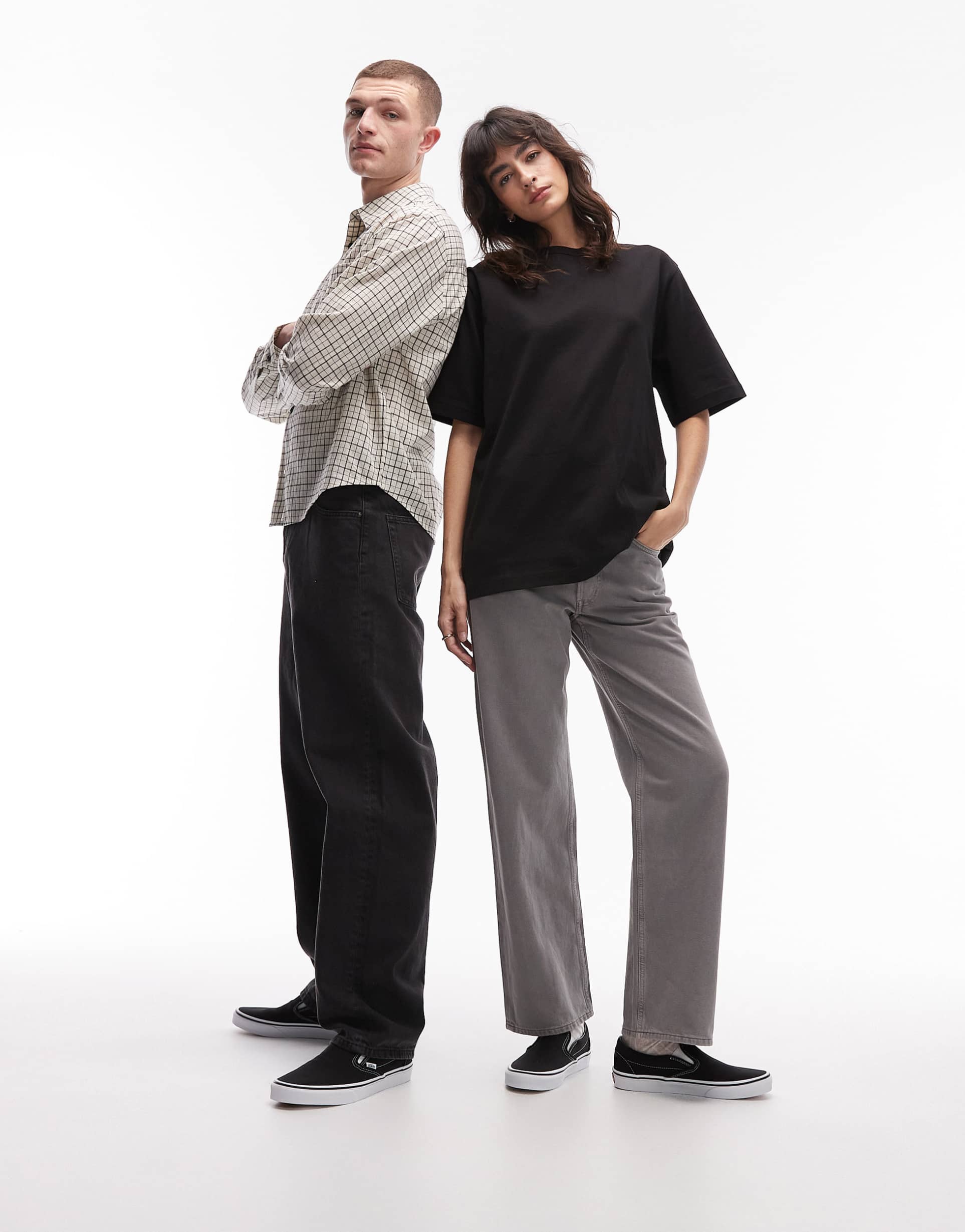 vans classic slip-on sneakers in black and white