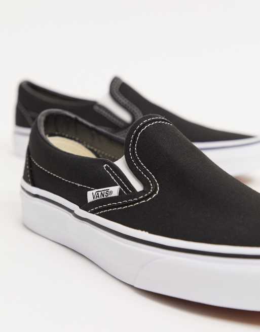 Vans classic slip on trainers in store black and white