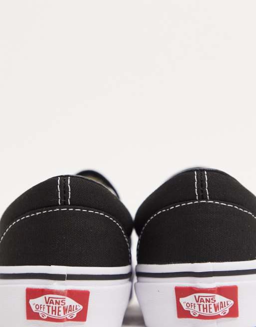 Plain black hotsell vans slip ons