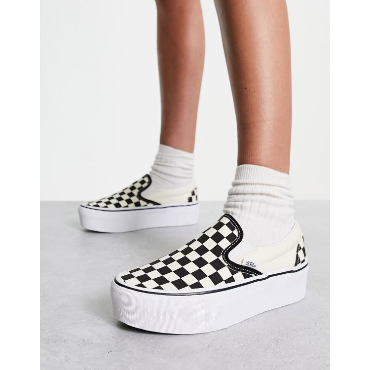 Black and grey checkered slip store on vans