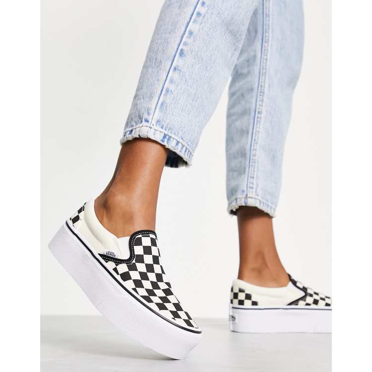 Vans classic slip on best sale black & white shoes