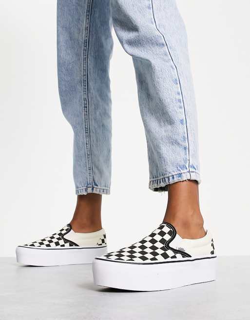 Vans classic slip on trainers in on sale black and white