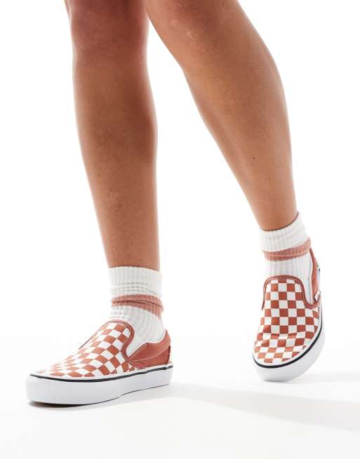 Vans classic slip on trainers in burnt orange and white checkerboard ASOS