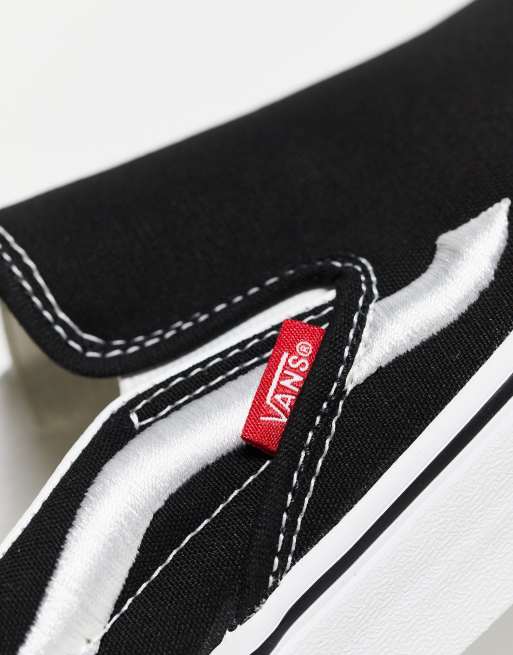 Vans nere con clearance striscia bianca