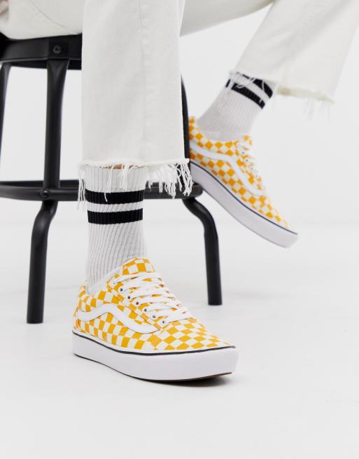 Checkered yellow old store skool vans