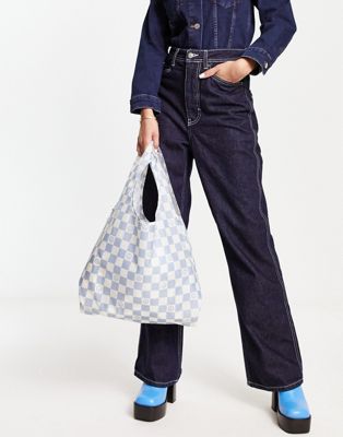 Vans Contortion checkerboard tote bag in white and blue