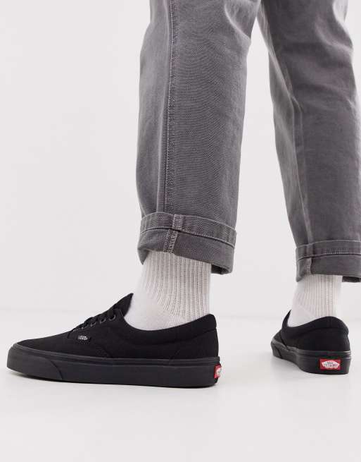 vans era all black on feet