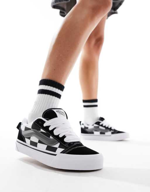 Black and check store vans