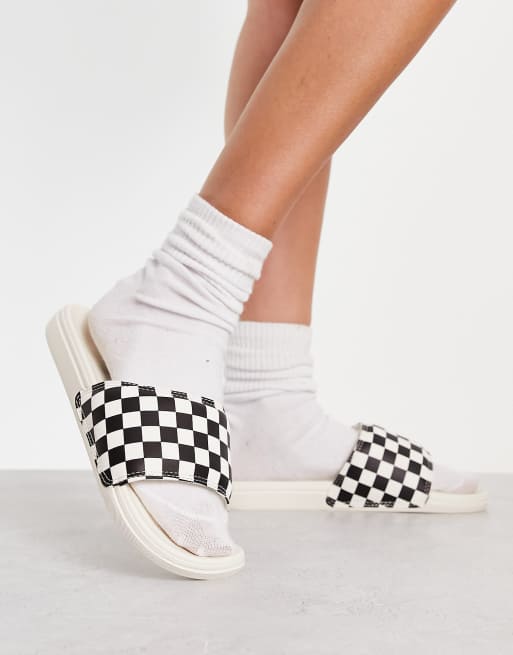 Vans La Costa checkerboard sliders in black and white