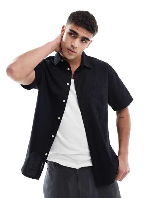 Vans – Lawson – Kurzärmliges T-Shirt aus Webstoff in Schwarz