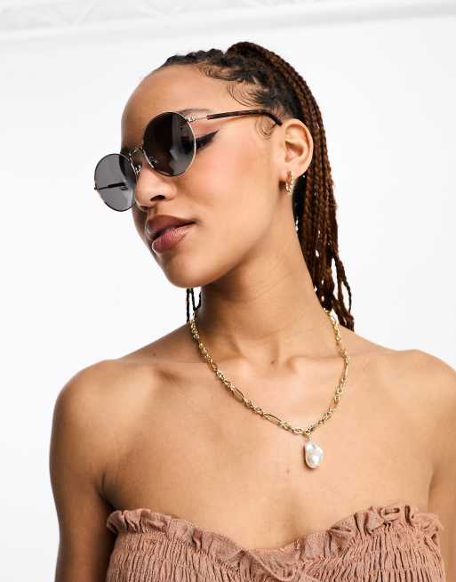 Vans sunglasses deals womens gold