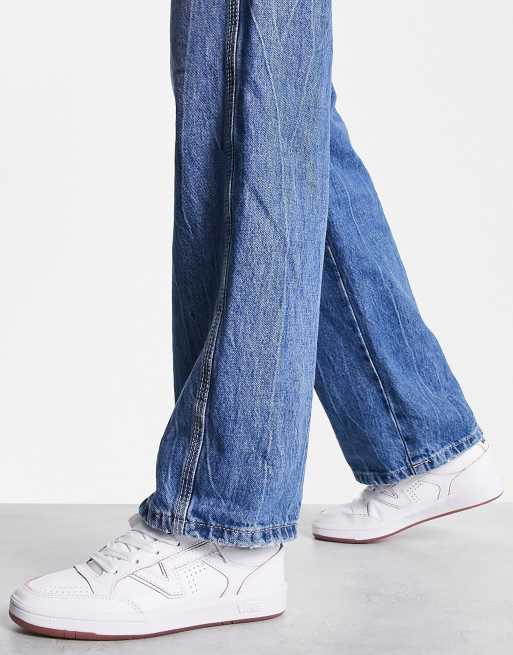 Vans Lowland sneakers in white and pink 