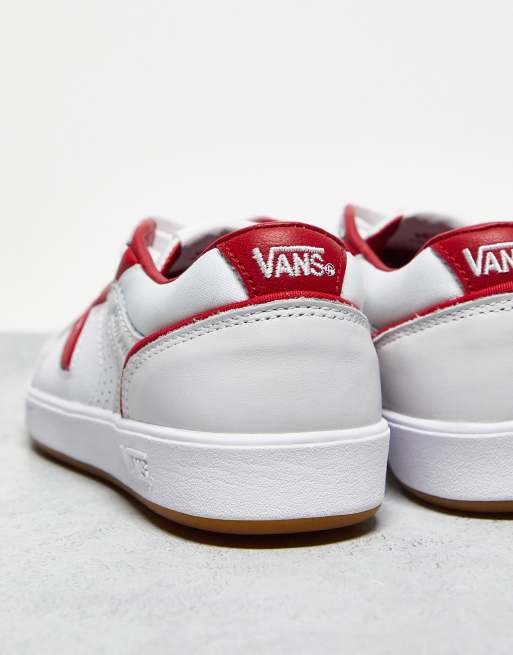 White and red store low top vans