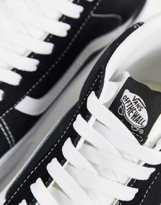 Vans Mid Skool 37 sneakers in black and white