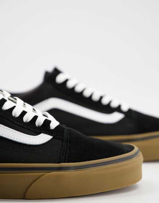 Black and white hotsell vans with gum sole