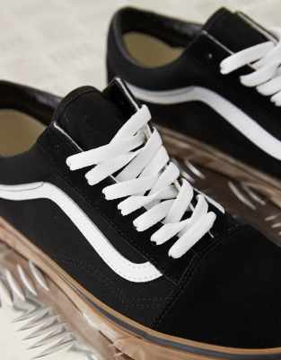 vans old skool gumsole trainers in black and white