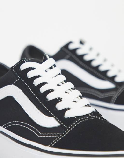 Vans Old Skool platform sneakers in black and white