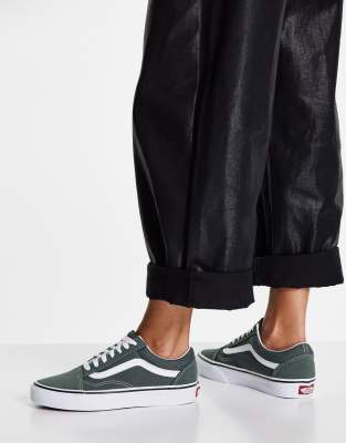 vans perforated leather slip ons