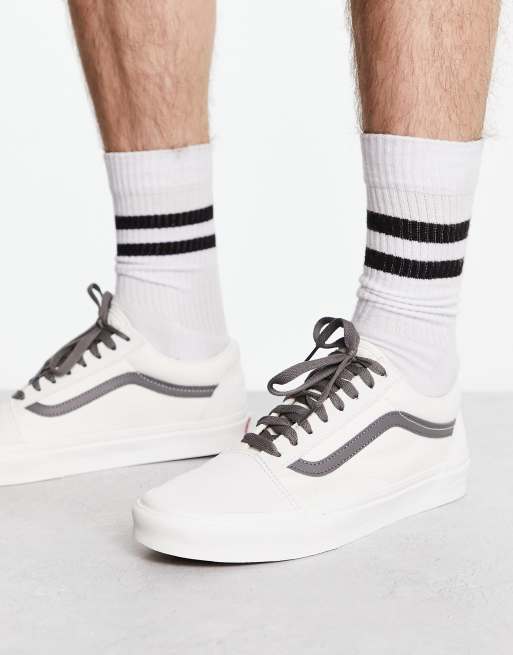 White store striped vans