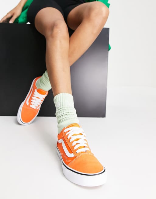 Orange vans best sale on feet