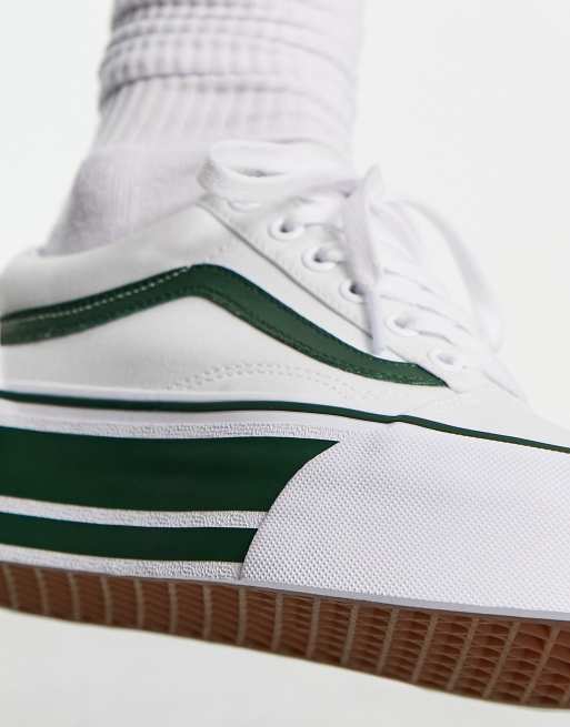 Vans Old Skool Stackform sneakers in white with green sports stripes