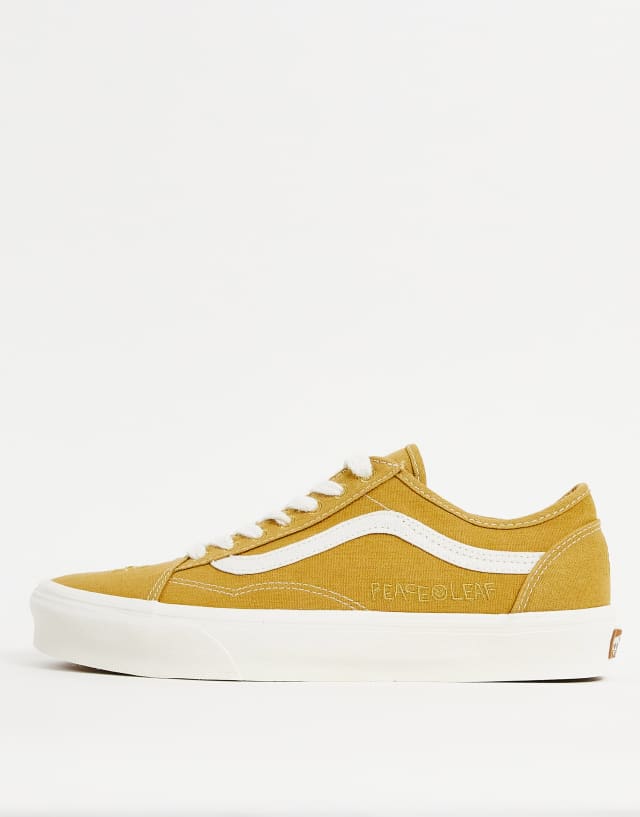 Vans Old Skool tapered sneakers with peace print in mustard