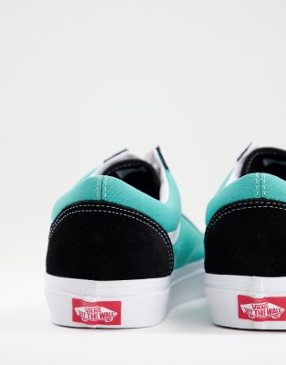 teal and black slip on vans