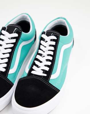 teal and black slip on vans