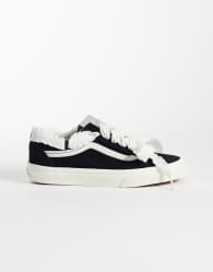 Vans Old Skool trainers in black and white with lace detail