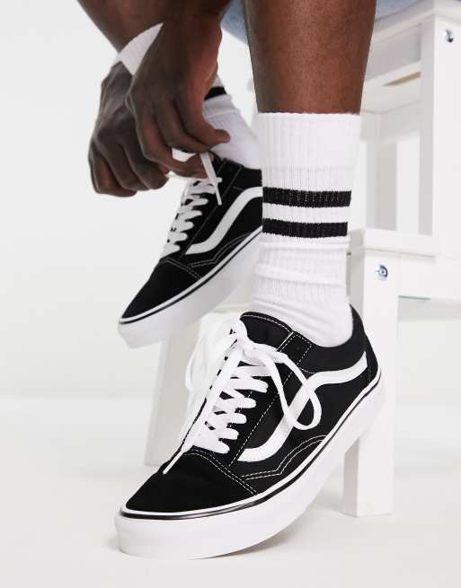 Vans white hot sale with black