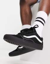Vans SK8 Low trainers in black with white side stripe ASOS
