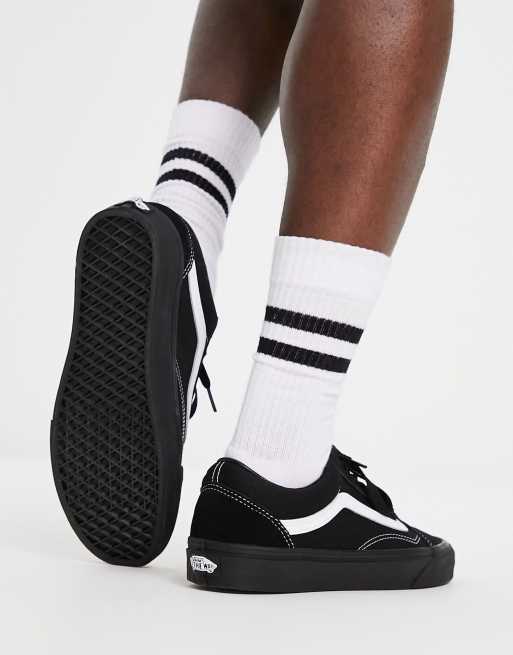 Vans all white deals with black stripe