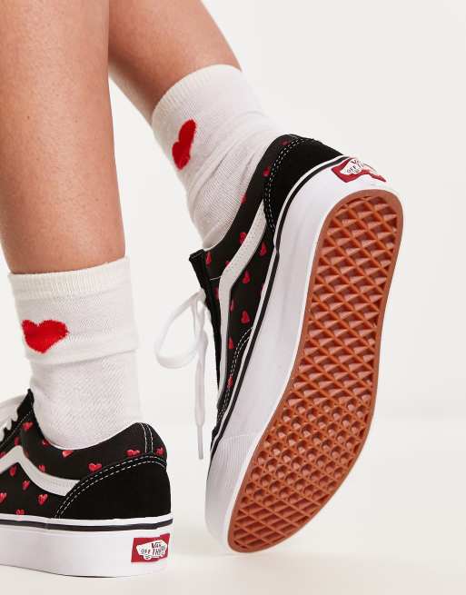 Vans black store with red stripe