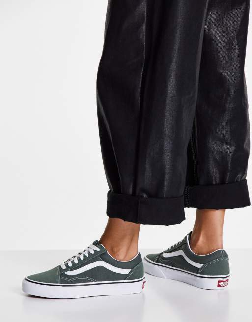 Dark green old store skool vans