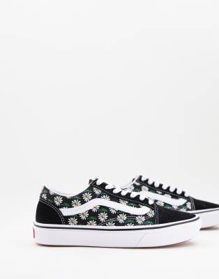 black vans with flowers on the side