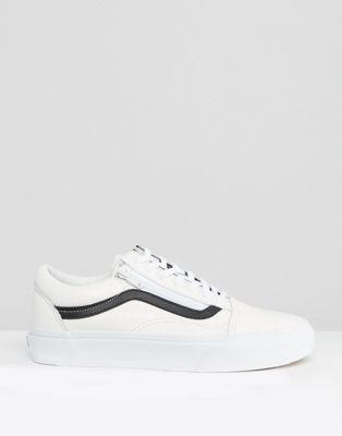 white and black leather vans
