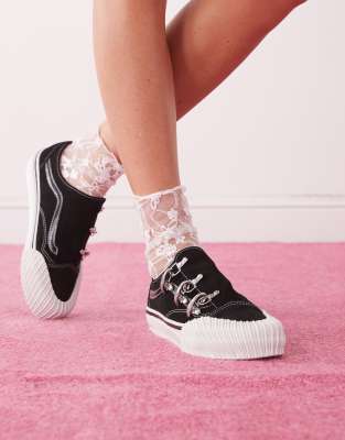 Vans - Premium Old Skool - Sneaker in Schwarz und Weiß mit Wickel-Design