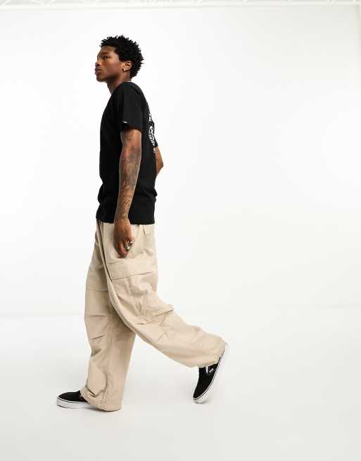 Vans Read Out T Shirt in Utility Pack Schwarz mit R ckenprint