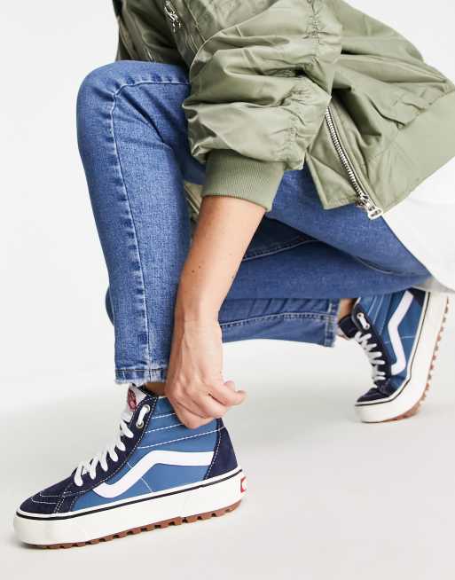 White high top on sale vans with blue stripe